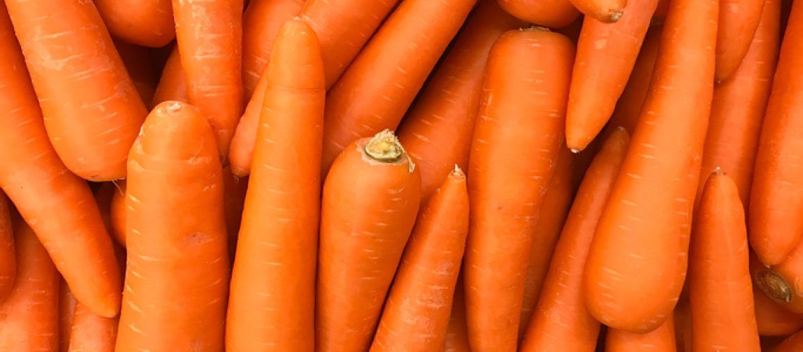 Close up of Textured image of carrots in department store shelves or supermarket